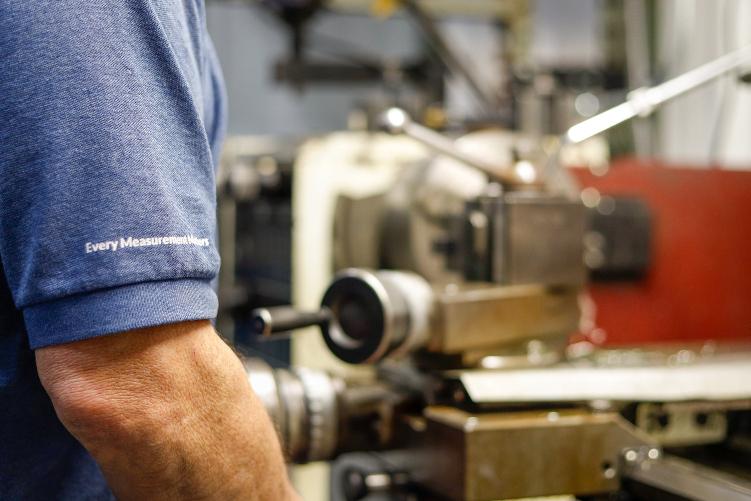 Standard Calibrations Inc. technician wearing Every Measurement Matters branded shirt